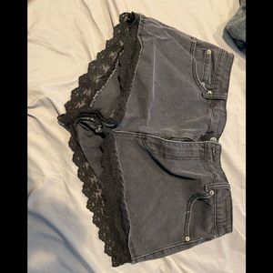 Black Jean shorts with lace trim used size 31